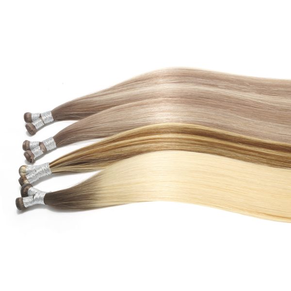 Two bundles of GENIUS WEFT Hair Extensions 7-Star Full Cuticle Remy Hair in brown and hazelnut colors
